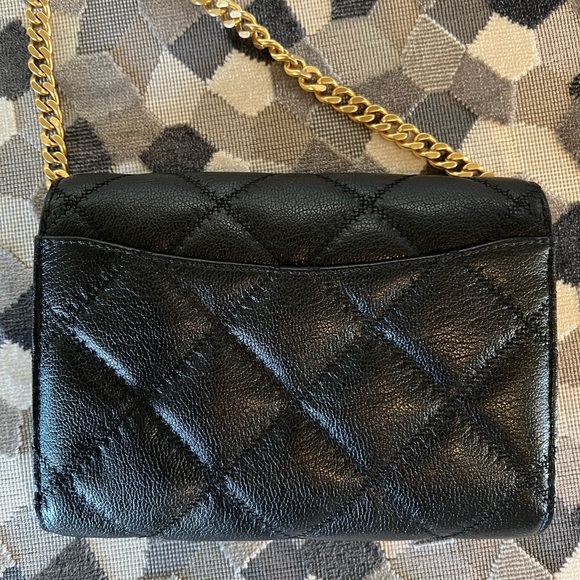 Tort Burch quilted black crossbody with gold detail. - Picture 4 of 9